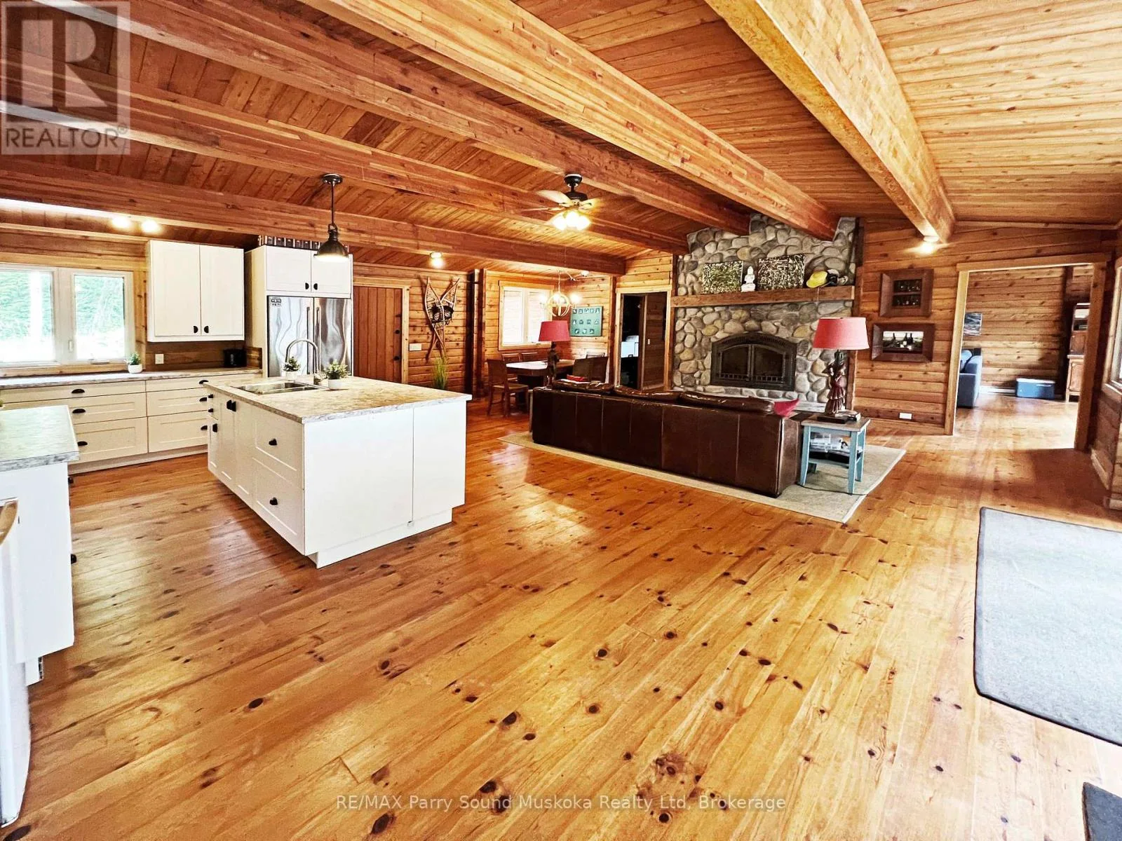 Open-plan cedar cottage kitchen and living room